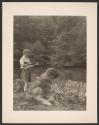 [Boy hunting with dog]