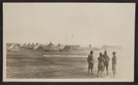 [Students of U.S. Aerial Photographic School talking in camp]