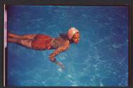 [Woman swimming]