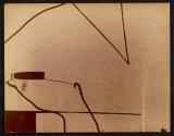 [Electric spark photograph of bullet with visible shock waves]
