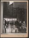 [Two men sitting in lobby, Museum of Modern Art, New York]