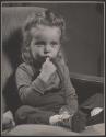 [Girl with finger in mouth]