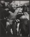 [Asian boys hauling cart or rickshaw]