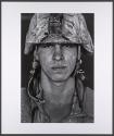 U.S. Marine Lcpl. Patrick "Sweetums" Stanborough, age 21 who is part of Alpha Company of the 24th Marine Expeditionary Unit (MEU) Battle Landing Team (BLT) 1/6, after a patrol in Garmsir District, Helmand Province, Afghanistan at Forward Operating Base Apache North.