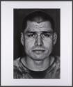 U.S. Marine Gysgt. Julian Lumm age 31 who is part of Alpha Company of the 24th Marine Expeditionary Unit (MEU) Battle Landing Team (BLT) 1/6, after building an Observation Post with sand bags in Garmsir District, Helmand Province, Afghanistan at Forward Operating Base Apache North.