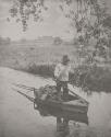 [Man in a small boat]