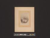 [Child at table with cat]
