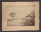 [Large estate view from river \ Road through small town]