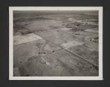 [Aerial view of fields]