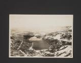 [Aerial view of lake in mountains]