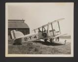 [Plane outside hanger]
