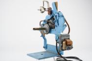 Mechanism for tin box style mutoscope