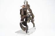 Mechanism for tin box style mutoscope