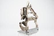 Mechanism for tin box style mutoscope