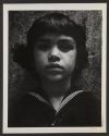 Portrait of young boy in sailor shirt