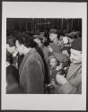 Voroshilov embracing a Polish worker in the city of Katovitse as thanks for gifts to the Soviet delegation