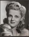 [Vivian Blaine]