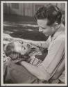 [Joan Blondell and Dick Powell]