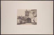[Two women standing in street]