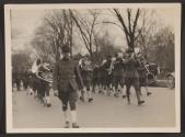 [Snapshot of military band in parade]