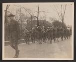 [Snapshot of military band in parade]