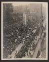 [Aerial view of parade]