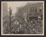 [Aerial view of parade]