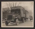 [Snapshot military vehicle in parade]