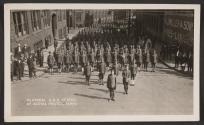 [Snapshot of officers and soldiers in parade]