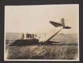 [Students standing next to crashed plane, U.S. Army School of Aerial Photography, Rochester]
