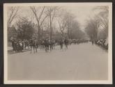 [Snapshot of soldiers and officers in parade]