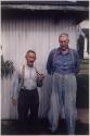 Two Mustachioed Men