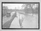 [auto passing flooded area]
