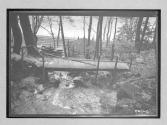 [auto tour near straw hut near river, railroad tracks]