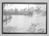 [auto tour, driving on flooded road]