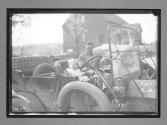 [man with child in auto]