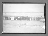 [spectators at beach]
