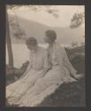 [Two women under a tree]