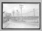 [auto & horse & wagon crossing bridge]