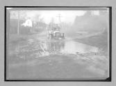 [auto driving through waterhole "White"]