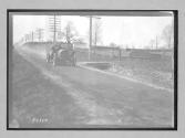 [auto racing on country road]