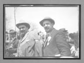 [close-up of two men]