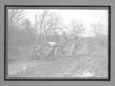 [auto tour "Premier" on country road]