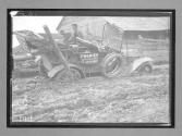 [auto tour "Premier Official" stuck in mud]