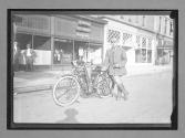 [man with motorcycle]