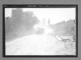 [auto racing on country road]