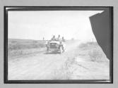 [auto racing on country road "white"]