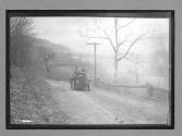[auto tour driving on country road]