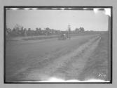 [auto racing on track, spectators]