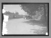 [auto tour parked on road]